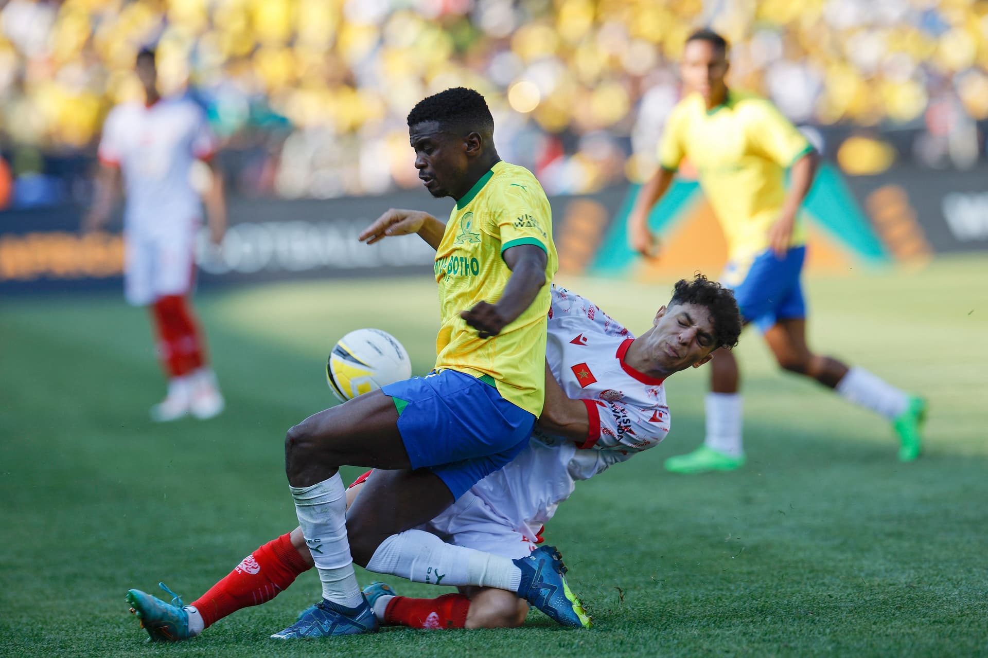 Abdellah Haimoud tackles Teboho Mokoena