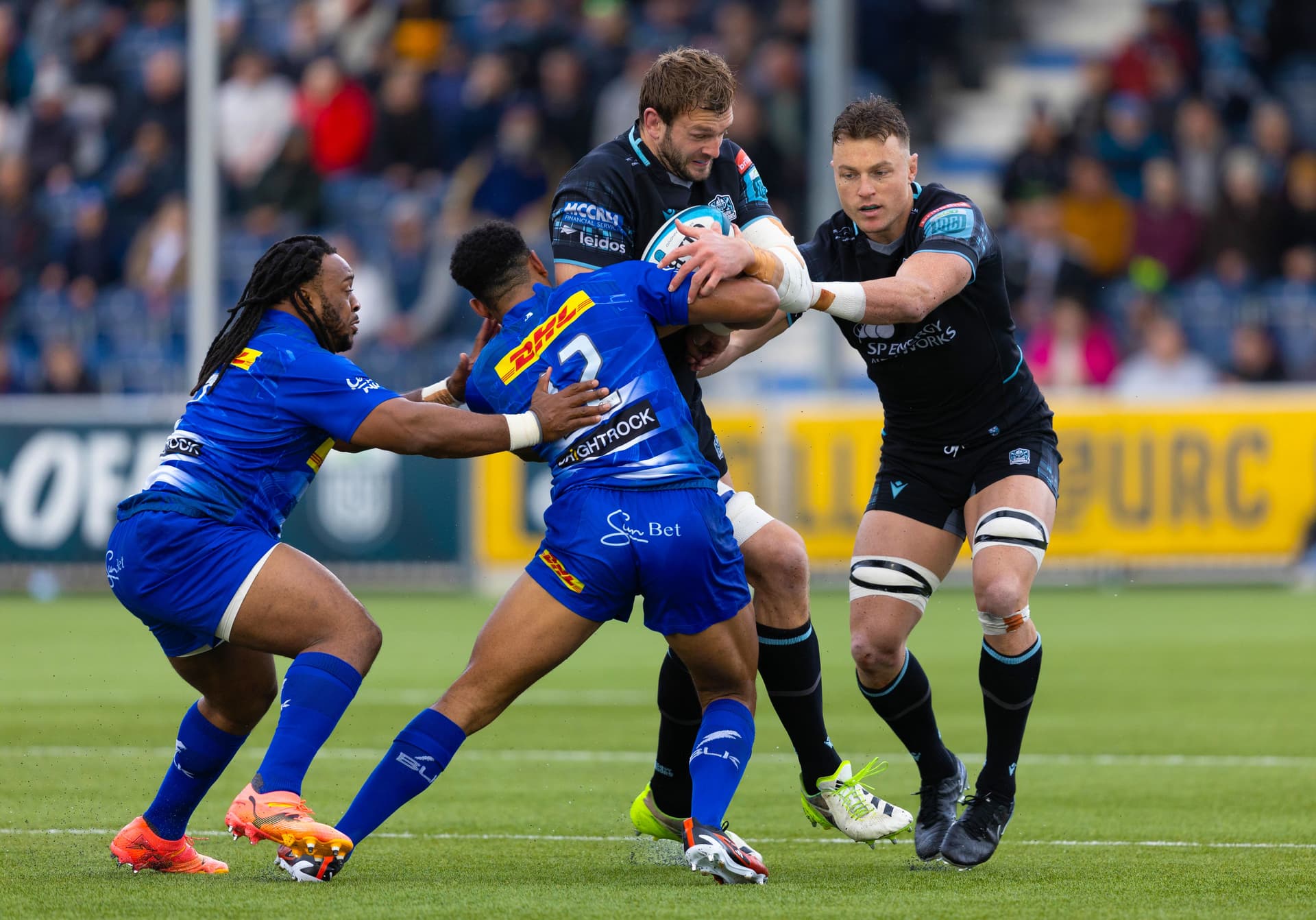 Richie Gray is tackled by Sacha Feinberg-Mngomezulu