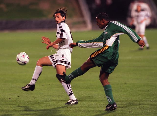 New Zealand's Raffaele Gregorio avoids a kick from