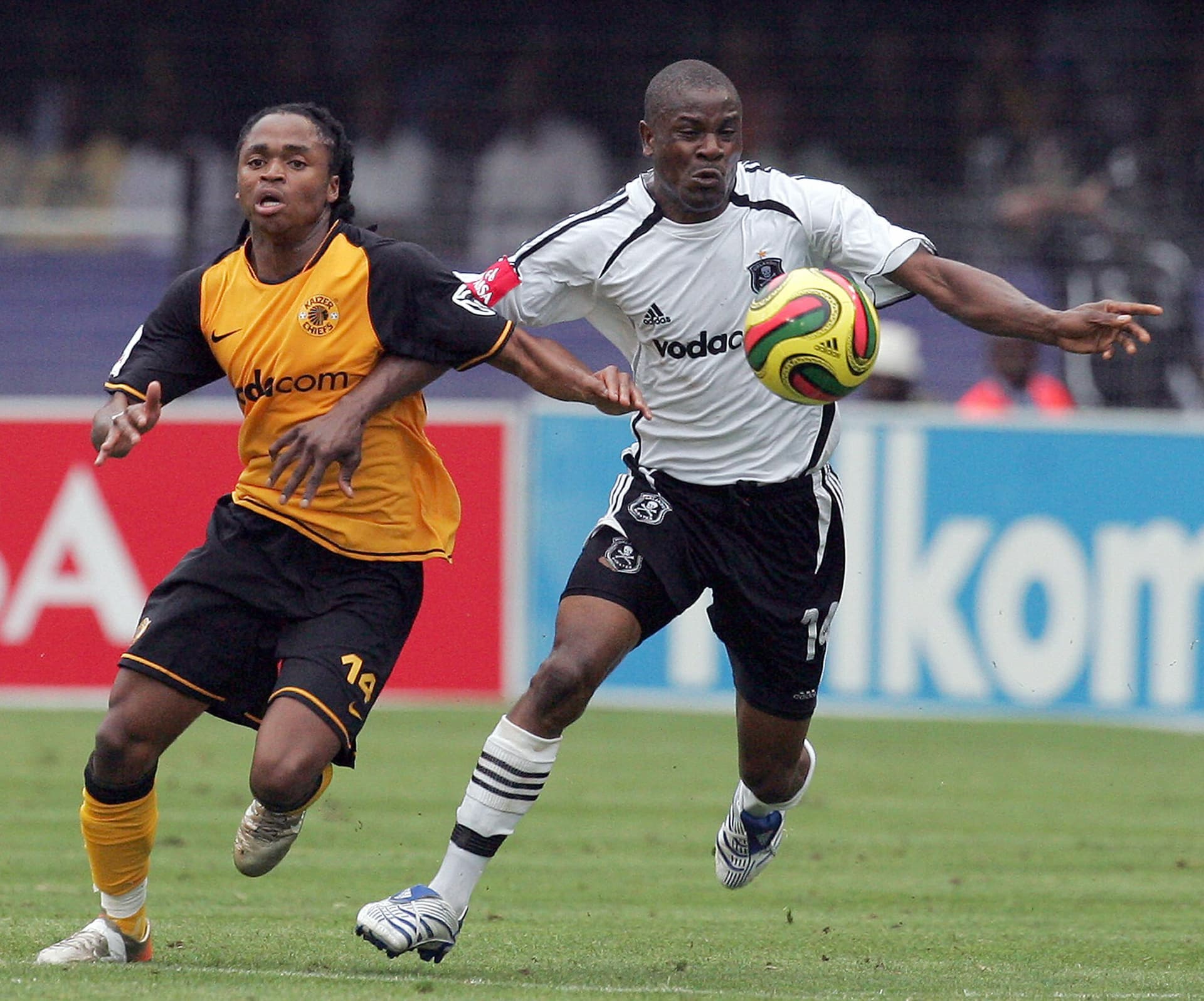Orlando Pirates' Lekgwathi Lucky (R) and