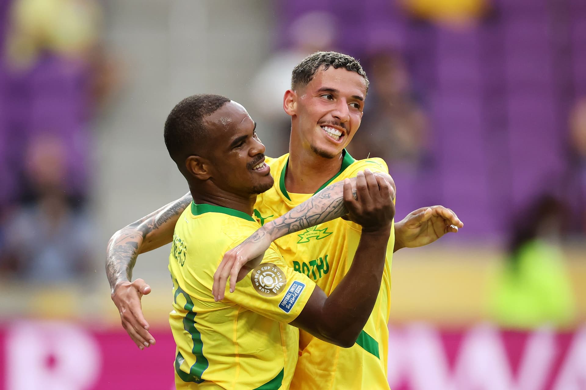 Iqraam Rayners #13 of Mamelodi Sundowns FC celebrates with Arthur Sales #9