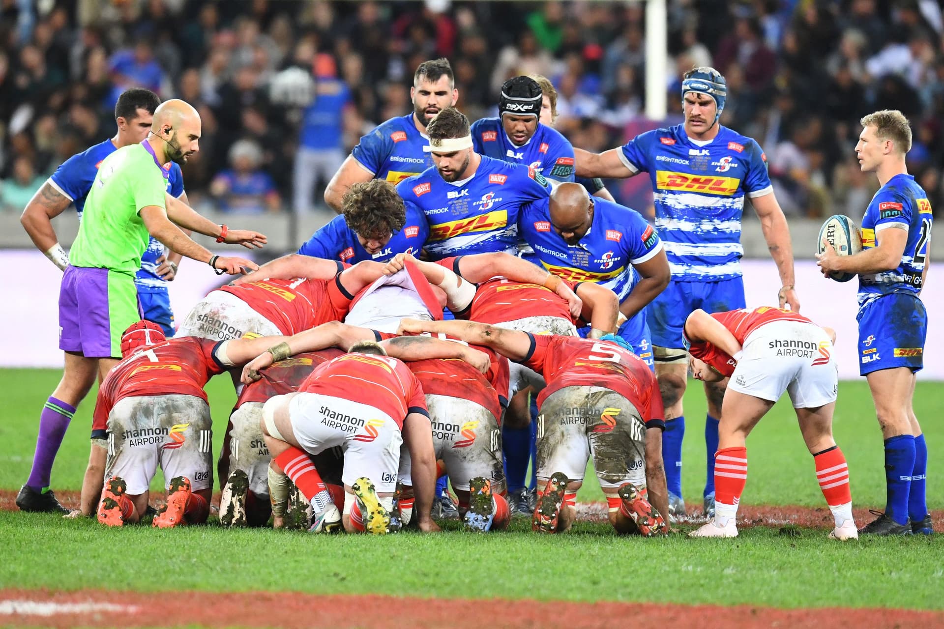 Players prepare to scrum during the United Rugby Championship final match between the Stormers and Munster