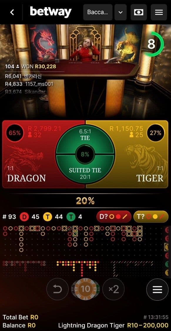 You can find Dragon Tiger by clicking on the Baccarat tab