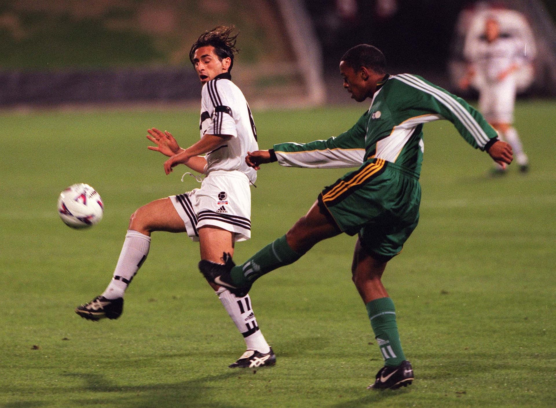 New Zealand's Raffaele Gregorio avoids a kick from